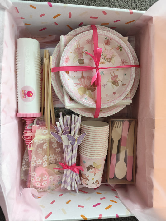 inside of a party bundle box , plates, straws, cups, cutlery