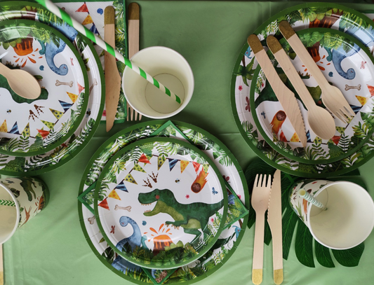 Flat lay tablescape of a dinosaur party